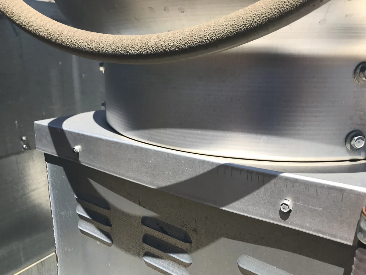 Rooftop grease containment equipment and work area